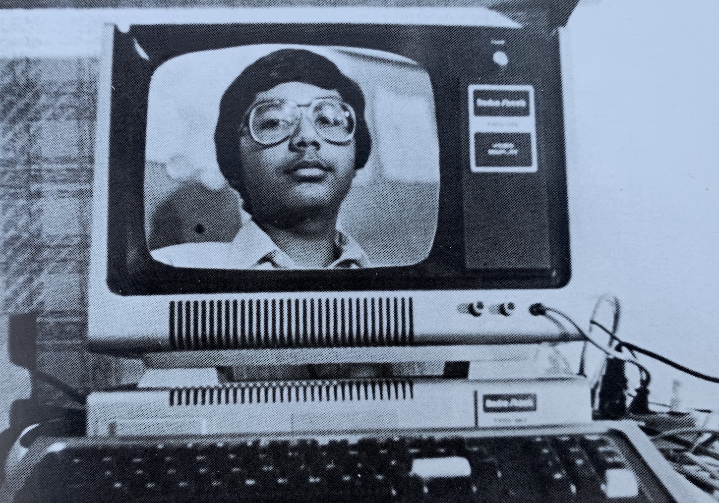 High-school senior yearbook photo — Subutai with his TRS-80